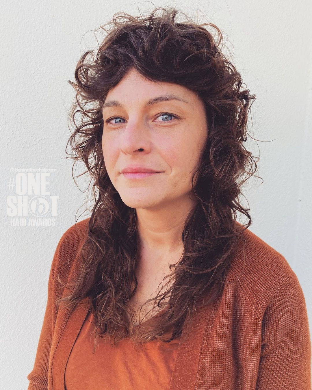 Relaxed long curly shag haircut