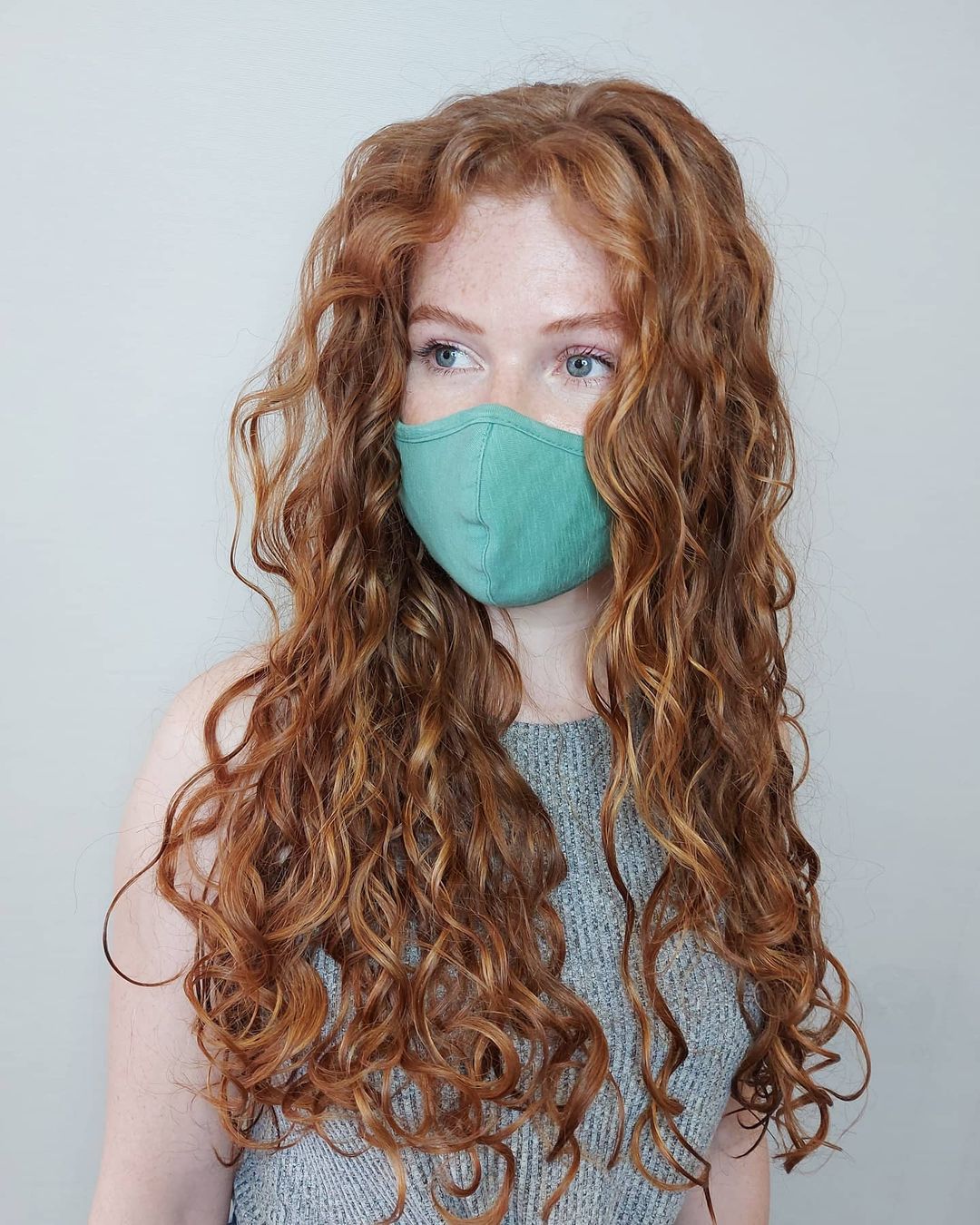 Long warm copper curly hair