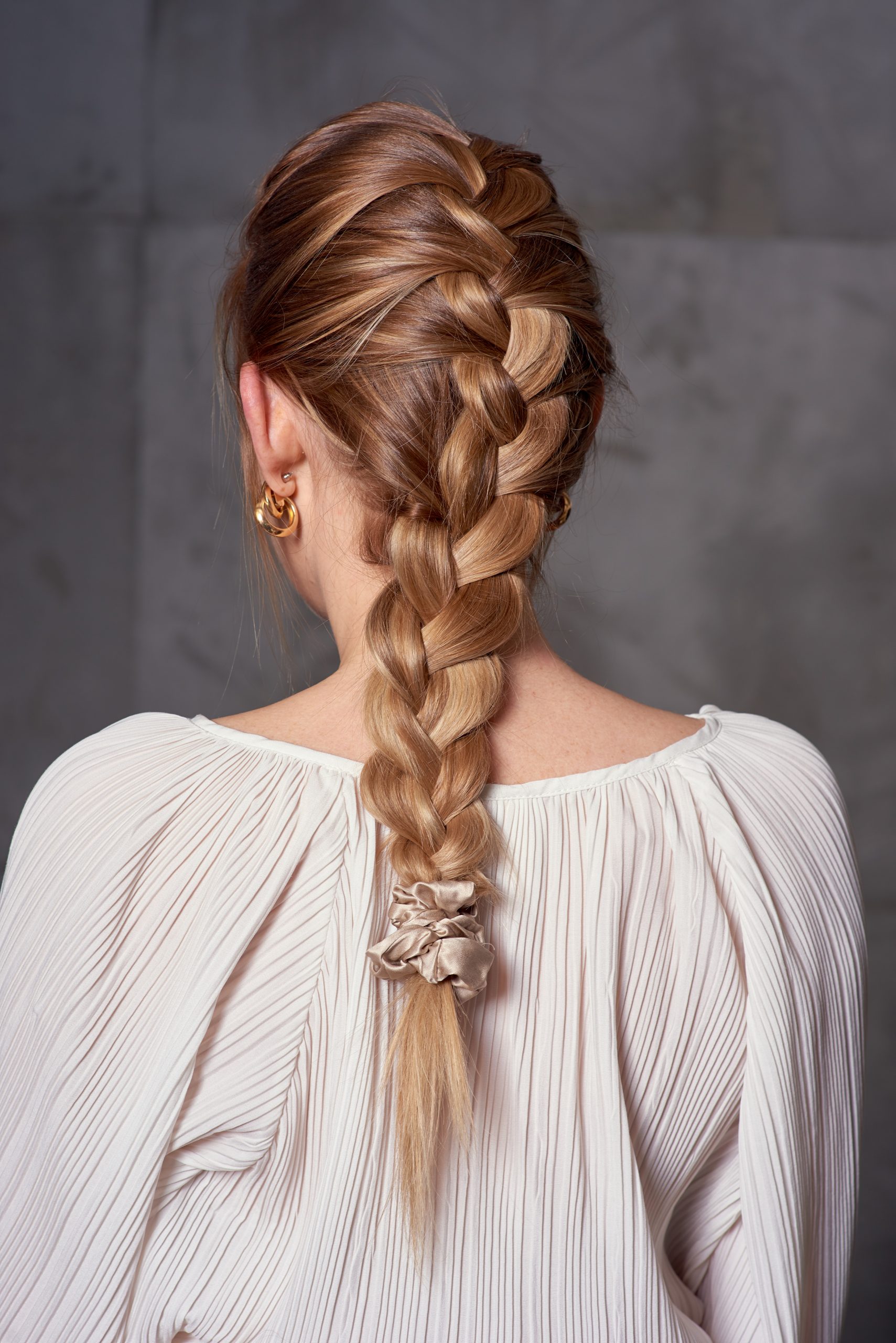 Braided Hairstyle: Front-sided french braids over loose flowing hair