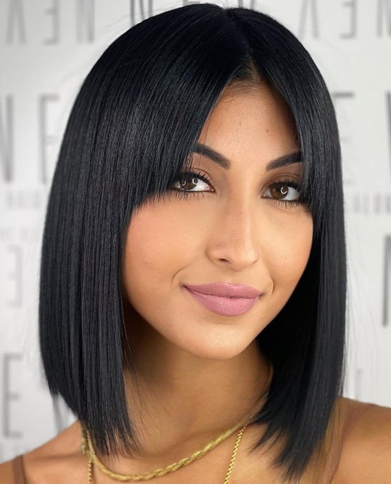 Sleek blunt bob with a short curtain fringe