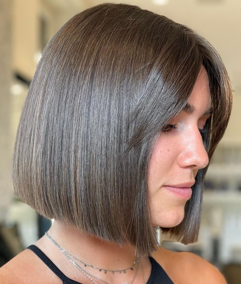 Angled bob with straight swept curtain bangs