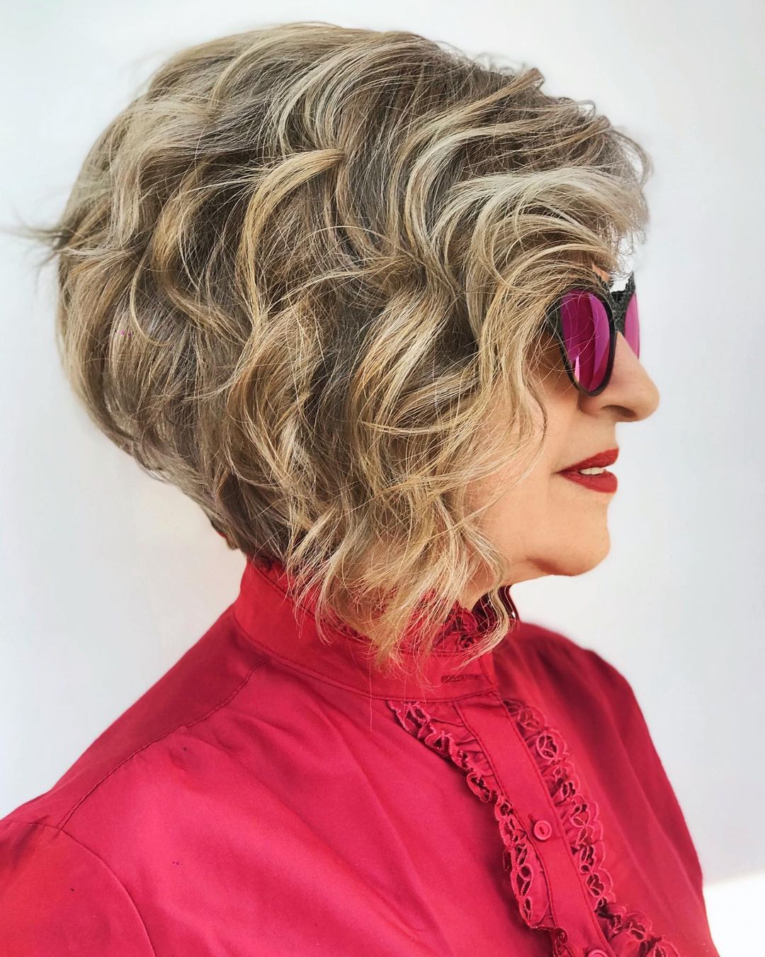 Short Stacked Bob with Curly Styling and Glasses