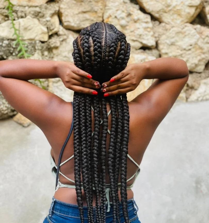 Straight-back cornrows combining medium and skinny braids