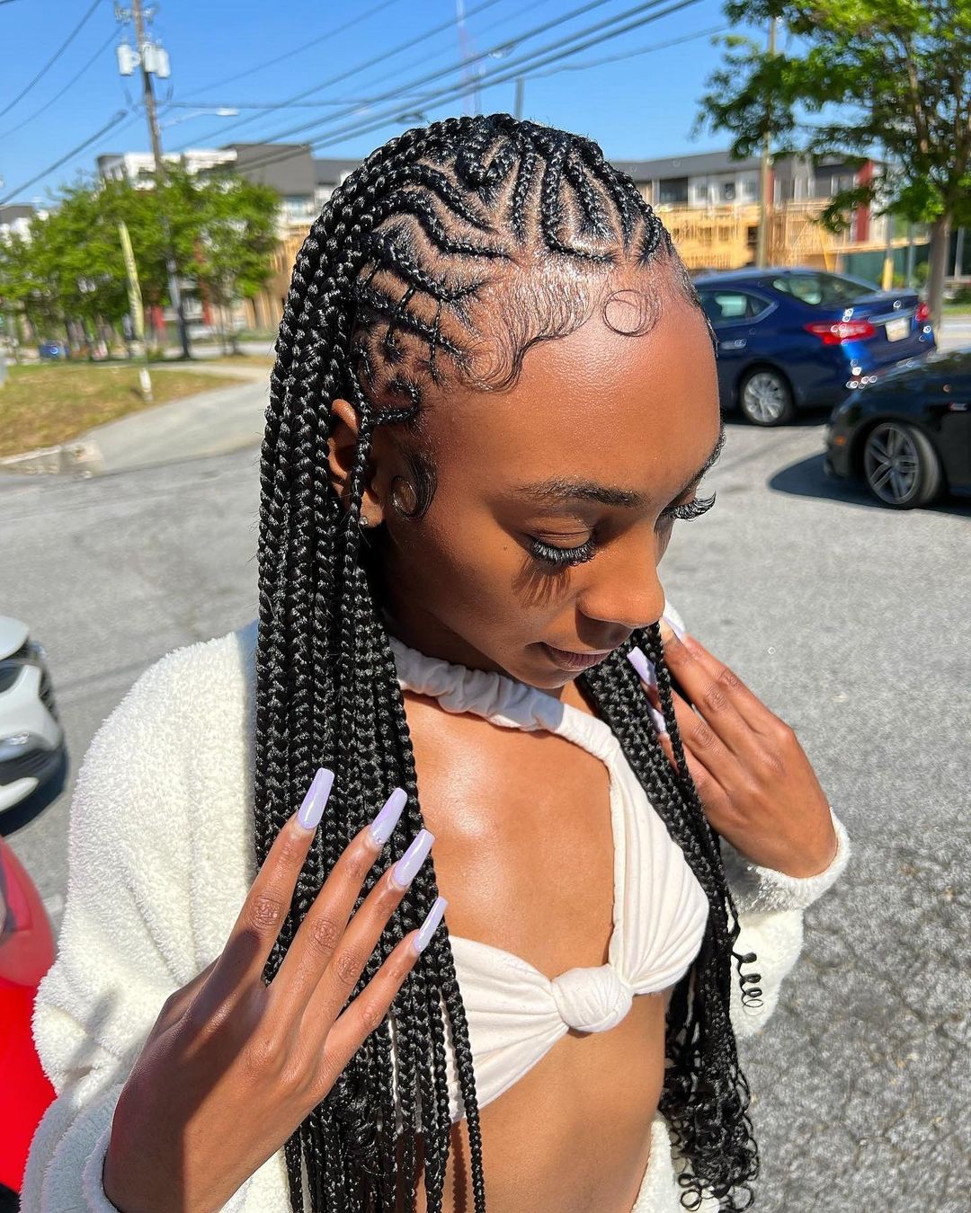Skinny freestyle tribal cornrows with a zigzag braiding pattern