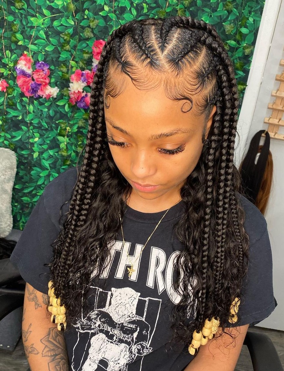 Cornrows to the back combined with loose curls