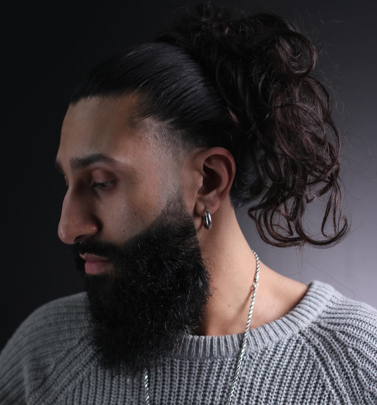 20 Dashing Hairstyles for Men with Long Curly Hair