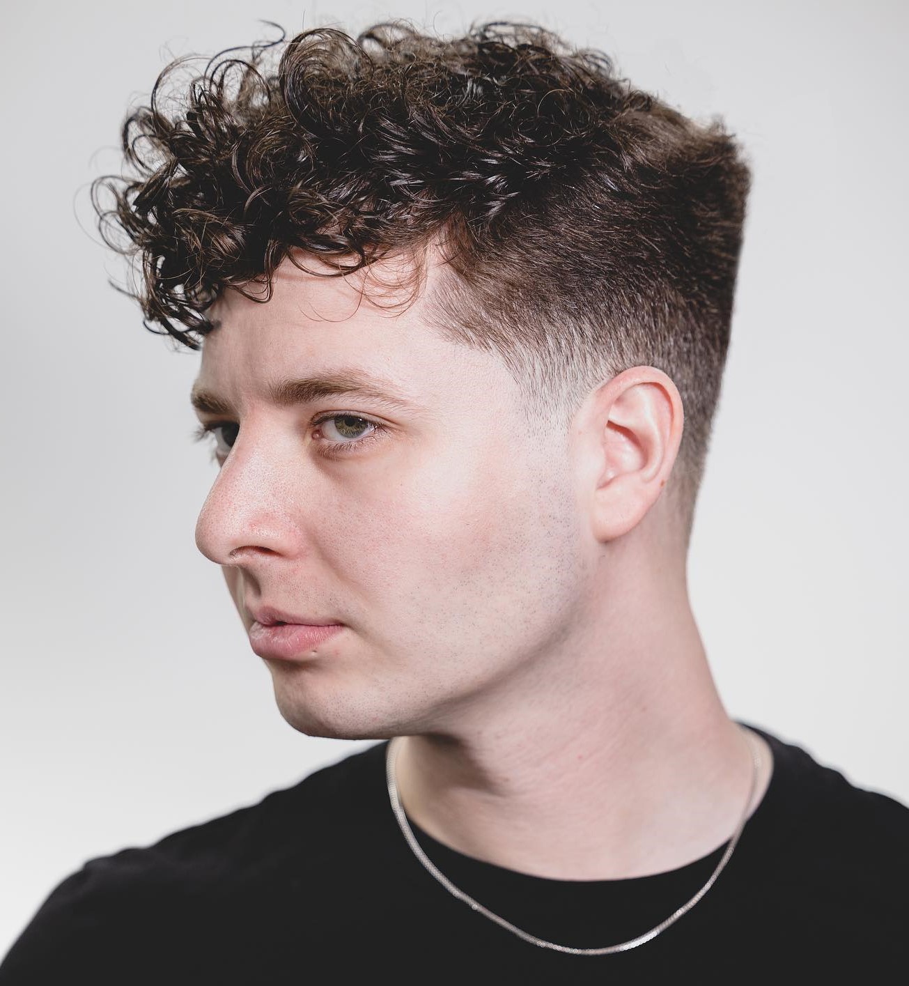 20 Short Curly Hairstyles for Men to Look Immaculate