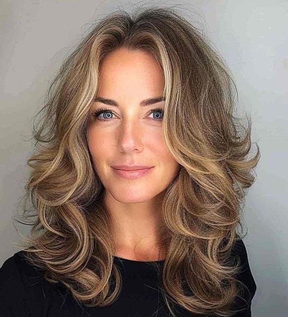22 Must-Try Butterfly Haircuts with Bangs for Added Texture and Allure
