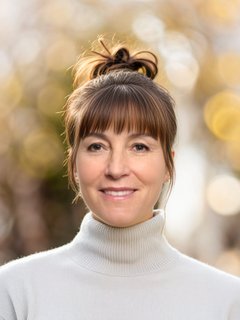 Messy Top Knot with Bangs