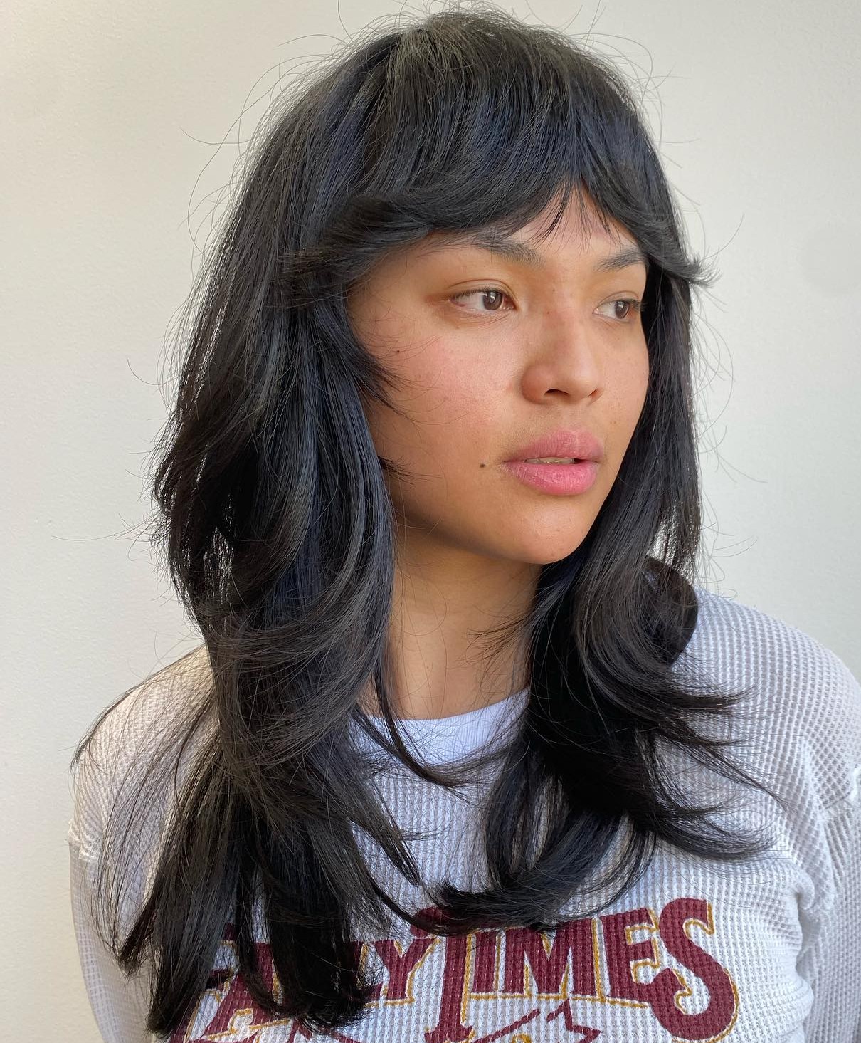 Long Brown Hairstyle with Piece-y Bangs