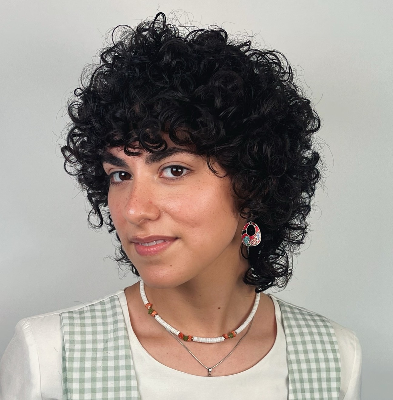 Short Curly Shag for Round Faces