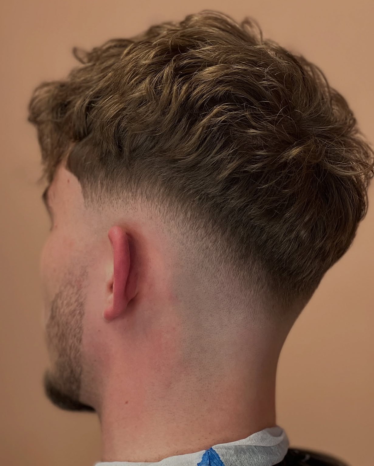 Blended Mid Fade for Wavy Hair