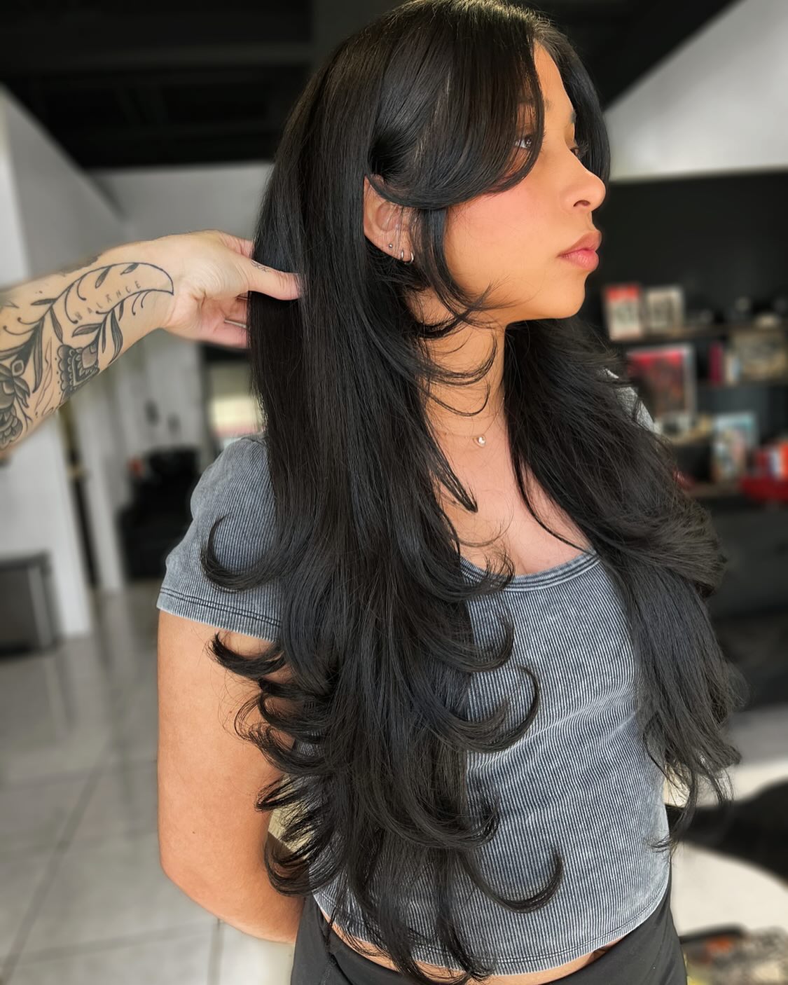 Trendsetting Waist-Length Butterfly Cut