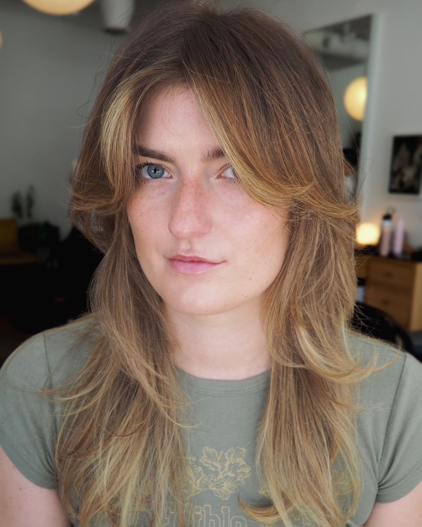 Long Feathered Hairstyle for Square Faces