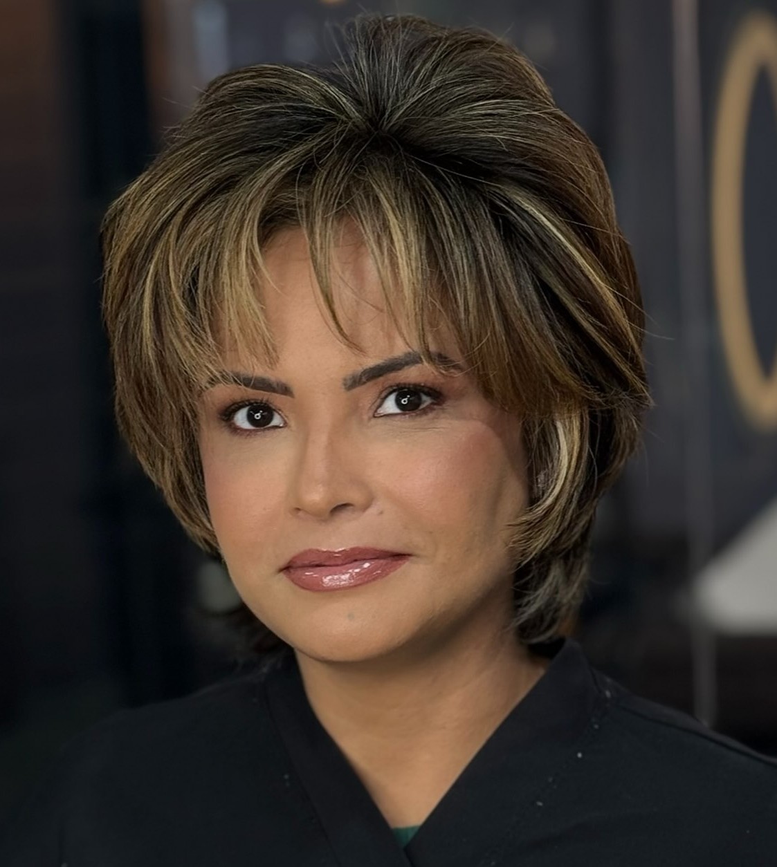 Short Feathered Cut for Round Faces