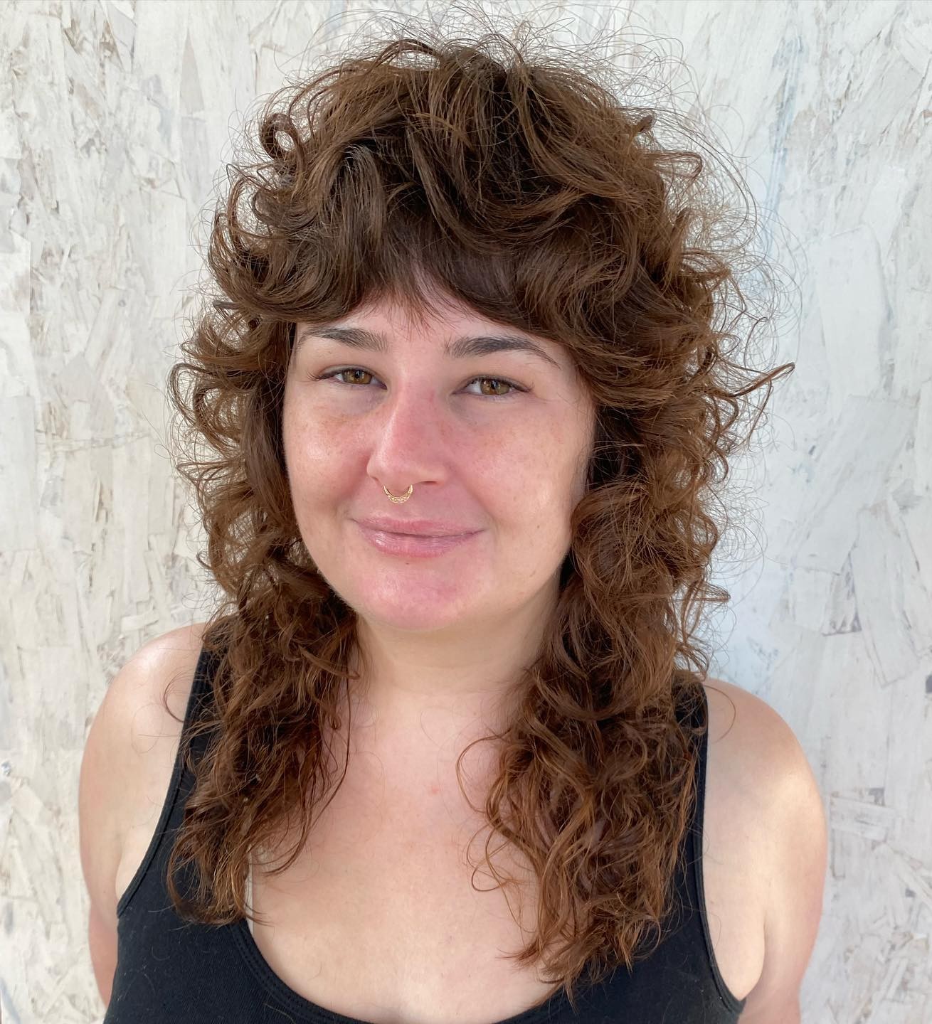 Layered Perm Style with Bangs