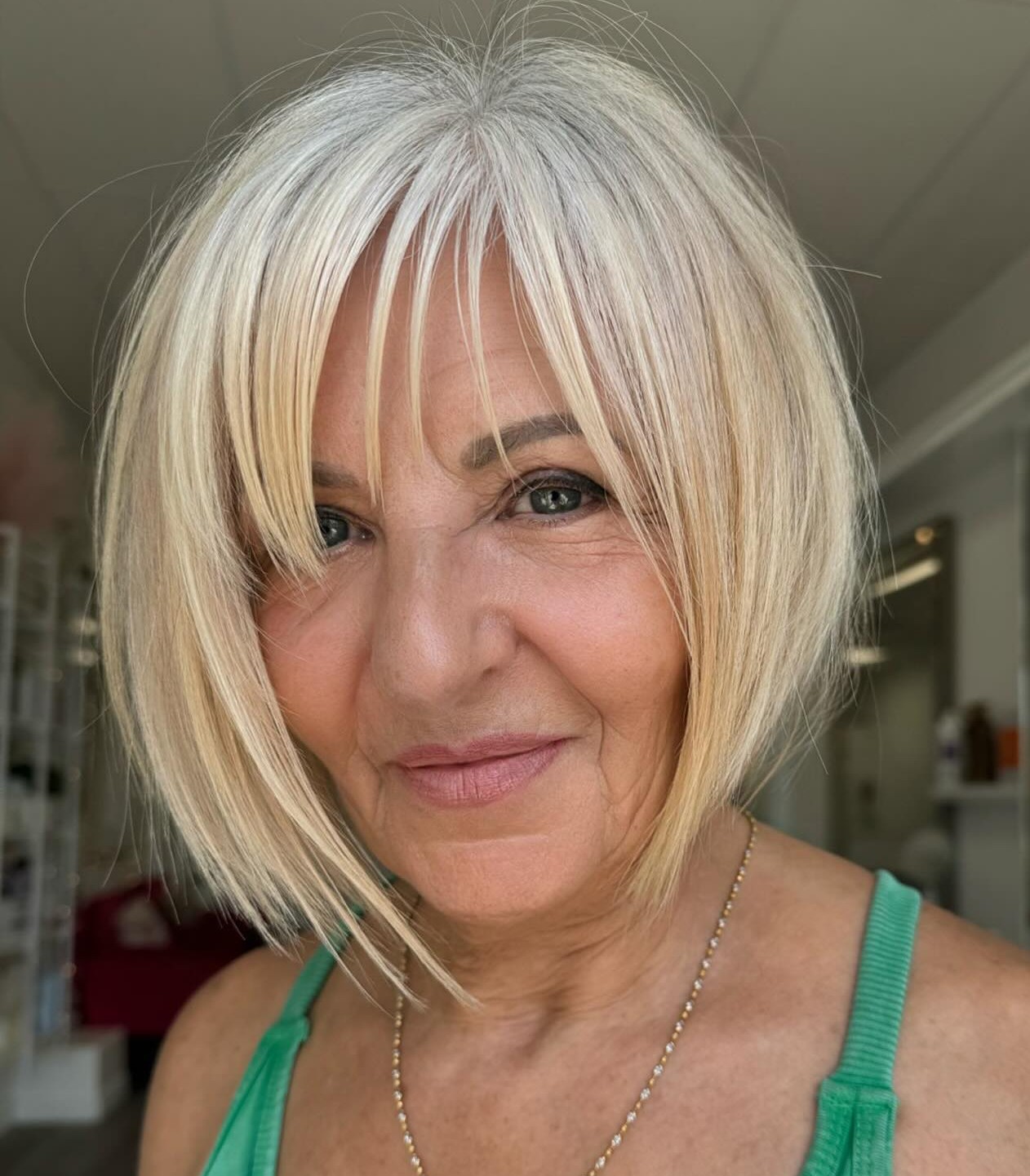 Older Heart Face With Half-Moon Bangs