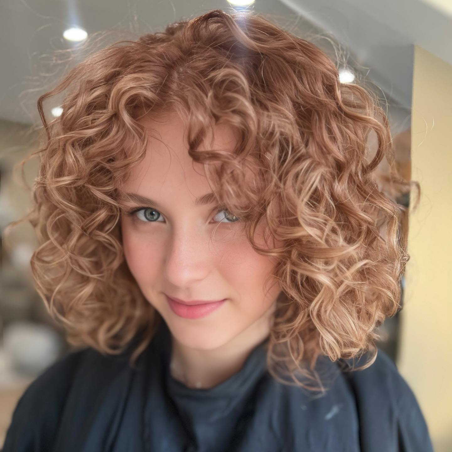Tousled Curly Strawberry Hairstyle