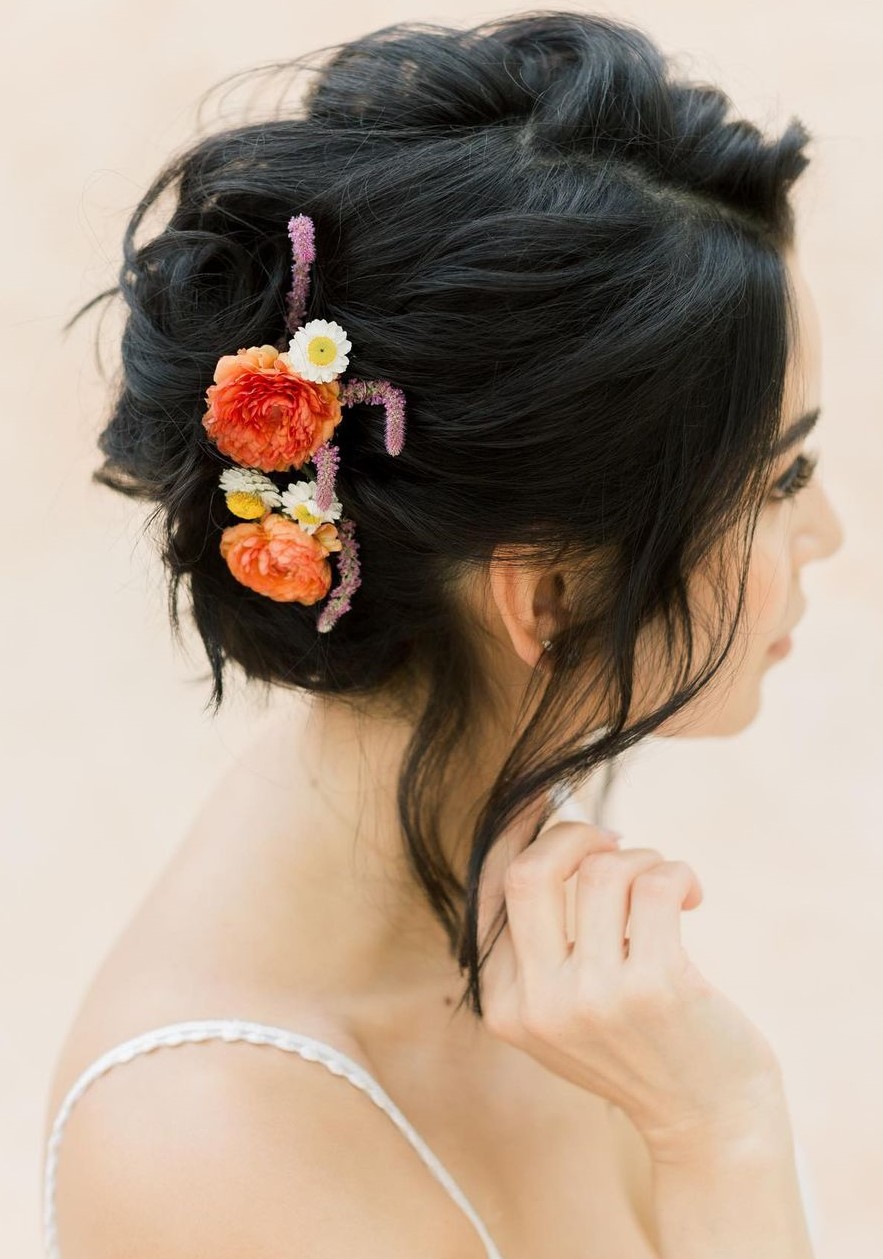Chic Updo with Floral Accessories