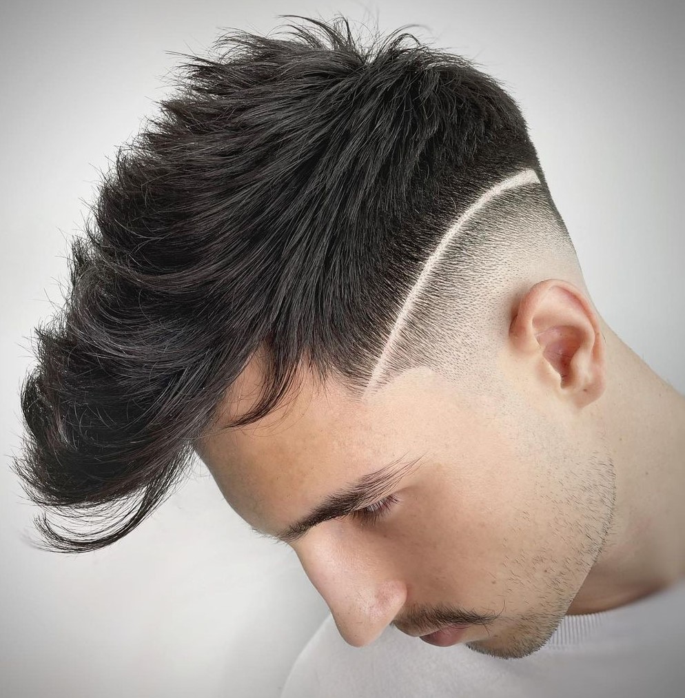 Faux Hawk Cut with a Curved Line Starting at the Temple